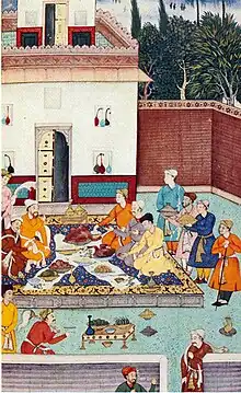 Banquete de los mirzas a Babur en 1507 c. 1590.
