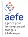 Logotipo antiguo de la AEFE (1990-2015).