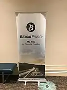 Roll up publicitario de bitcoin