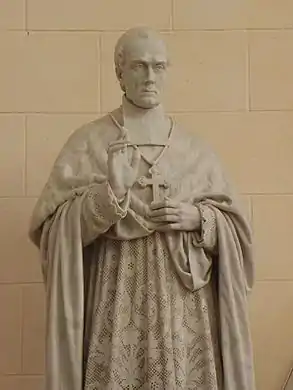 Memorial a monseñor Brossay-Saint-Marc en Bourg-des-Comptes. Esta obra fue inaugurada el 19 de septiembre de 1880.