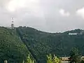 La montaña y el cartel hollywoodiense de Braşov.