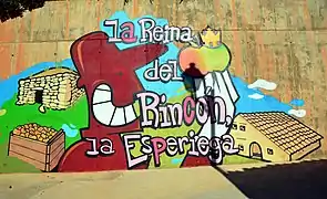 Grafiti en El Cerrado de Casas Bajas, relativo a la VI Fiesta de la Manzana (2018).