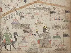 El rey Mansa Musa y un viajero a camello ilustran la zona sahariana del Atlas catalán.