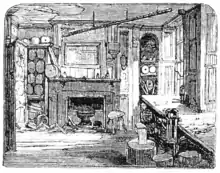 Una ilustración en blanco y negro de una habitación de la casa de Cock Lane.