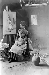 Elizabeth Forbes en su estudio, alrededor de 1890