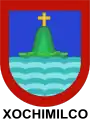 Escudo otorgado a la entonces ciudad de Xochimilco el 4 de marzo de 1559 por Felipe II. Usado durante el régimen municipal cuando Xochimilco fue cabecera de municipio o prefectura, es objeto actualmente de una especie de disputa entre Milpa Alta y Xochimilco.
