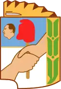 Escudo de la Provincia Presidente Perón (Chaco) entre 1951 y 1955. El «Ojo vigilante del pueblo» y la silueta de Perón no son utilizadas en la actualidad.