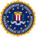 El escudo del FBI, donde el círculo de estrellas representa la unidad de los 13 estados originales.