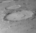 El cráter marciano de Galle, que se muestra en esta imagen de la NASA, aparece en Watchmen sugiriendo el motivo recurrente del smiley.