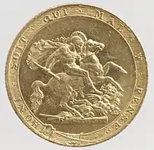 Una moneda de oro que muestra como elemento central a un hombre desnudo sobre un caballo atacando a un dragón con una lanza rota.