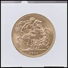 Una moneda de oro fechada en 1911 con el diseño de San Jorge y el dragón