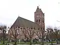 Goutum, iglesia reformada de Santa Inés, construida en estilo románico en el siglo XII.