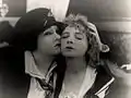 Con Gloria Swanson (izq.) en Her Decision (1918)