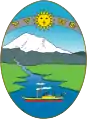 Escudo del escudo de armas del Ecuador, con Inti sobre el paisaje.