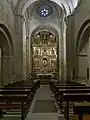 Nave central y retablo mayor romanista