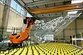 Industria de vidrio: manejo de láminas de vidrio, robot de carga pesada con 1,000 kg de carga