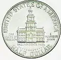 Reverso de la moneda de 50 centavos conmemorativa del Bicentenario, fechada 1776-1976.