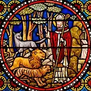 Vidriera de Saint Austremoine d'Issoire, con el santo entre las bestias