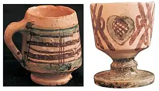 Taza y copa decoradas en verde y manganeso, siglo XIV. Museo Provincial de Teruel (España).