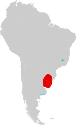 Distribución actual de la especie en rojo; exhumaciones de restos fósiles en celeste.