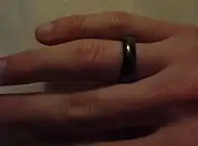 A smooth circular band of magnetite on a finger