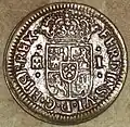 Reverso de moneda de 1 maravedí (cobre) de Fernando VI con "ceca" de Segovia del año 1747.