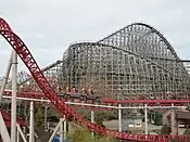 An overview of the Mean Streak roller coaster in the background with the Maverick roller coaster in the foreground