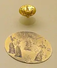 Anillo de oro minoico con una representación quizá de una danza ritual.