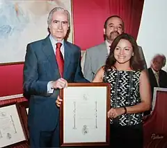 Mónica recibe la designación de Miembro de mérito por la Fundación Carlos III,