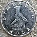 Reverso de una moneda de un dólar de Zimbabue.