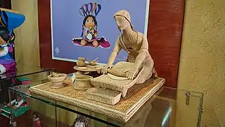 Muñeca de mimbre en el Museo de la muñeca artesanal