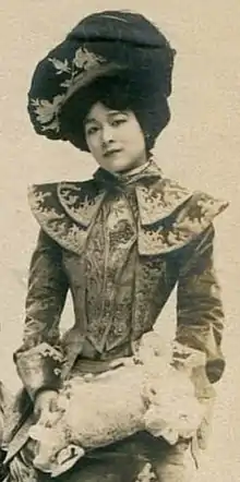Photo of a young, serious-looking Nellie Yu Roung Ling