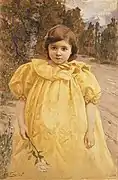 Niña con vestido amarillo.