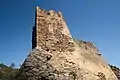 Vestigios del castillo, con la torre del homenaje cuadrada del siglo X