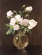 Rosas en un jarrón de vidrio