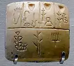 Tableta con caracteres pictográficos proto-cuneiformes mesopotámicos (finales del cuarto milenio antes de Cristo), Uruk III.