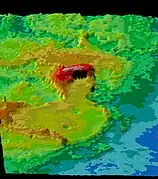 Representación en perspectiva de Ishtar Terra, en el centro de la imagen está Maxwell Montes, según su elevación en rojo y sus picos como Skadi Mons en blanco.