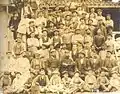 Pachín en Gijón con otros obreros a principios del siglo XX.
