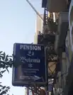Cartel de una pensión en Ceuta.
