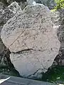 Piedra con inscripción.