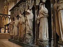 Plorantes del sepulcro de Carlos III el Noble en la catedral de Pamplona, de Janin Lomme (1419).