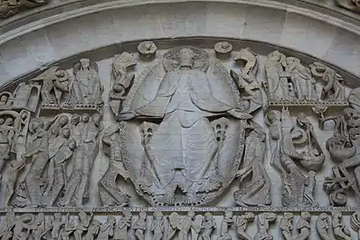 Detalle de la Portada del Juicio de la Catedral de Saint-Lazare de Autun. A la izquierda de Cristo Juez, San Miguel pesa las almas.