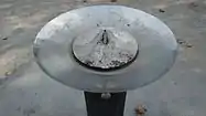 Fuente con el grifo actuando también como gnomon en un reloj de sol, en la ciudad de Zaragoza