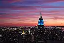 Empire State Building lighted in blue and white at sunset on 19 November 2009; lighting design Douglas Leigh