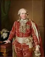 Retrato de Samuel af Ugglas vestido con traje de época color rojo y detalles dorados. Lleva capa y cinturón del mismo color. La mano derecha reposa sobre un escritorio.