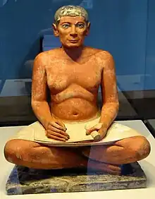 El escriba sentado, escultura del Antiguo Egipto.