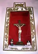 Detalle de Cristo crucificado en la iglesia parroquial de Sesga (Ademuz), situado a los pies, lado de la epístola (2017).