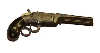 Smith & Wesson Volcanic, calibre .31, entre 1854 a 1855.