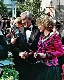 Steven Bochco and wife Barbara Bosson on the red carpet at the Emmys in 1994