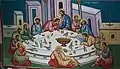 Fresco de una iglesia macedonia (la escena se representa con una mesa redonda, los apóstoles acomodados en cojines y aparadores con candelabros).